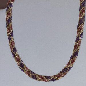 Necklace woven from glass beads